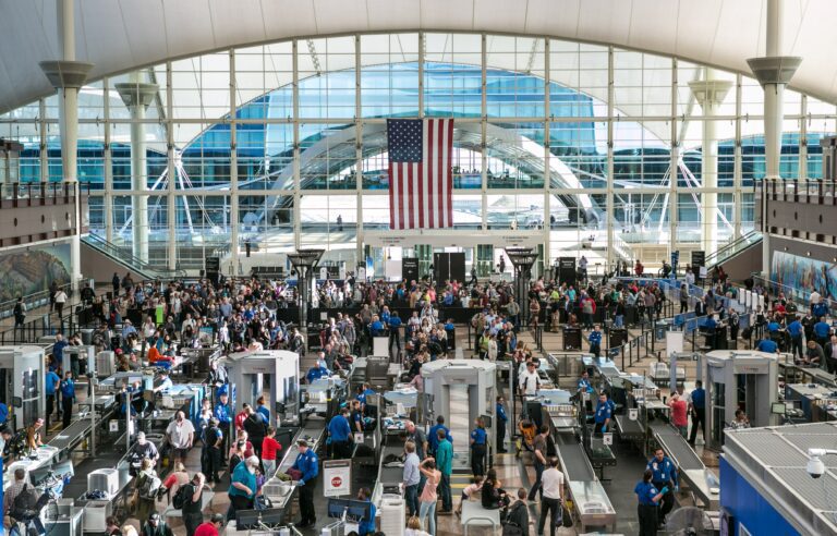 crowded airport GettyImages 670570760 scaled