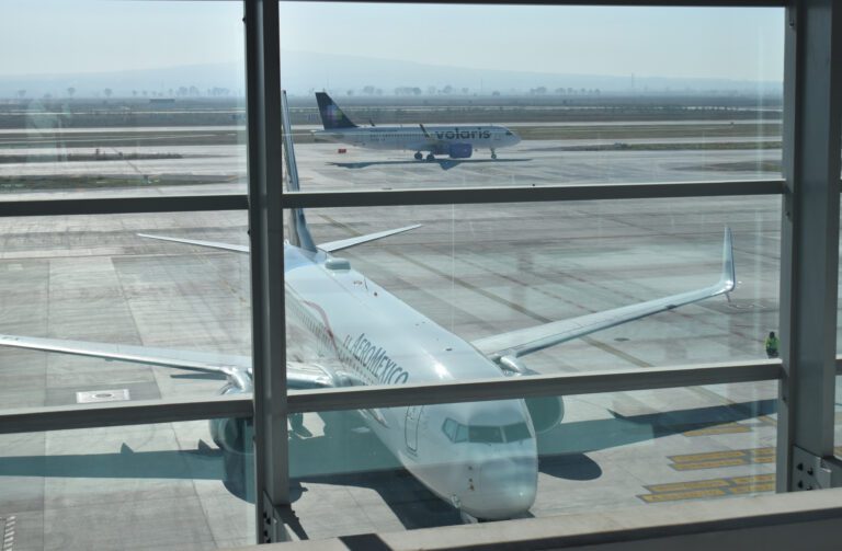 An Aeromexico Boeing 737 and a Volaris aircraft parked in Mexico Citys Felipe Angeles International scaled