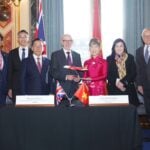 Vietnamese UK and VietJet officials celebrating VietJets Airbus A321neo order