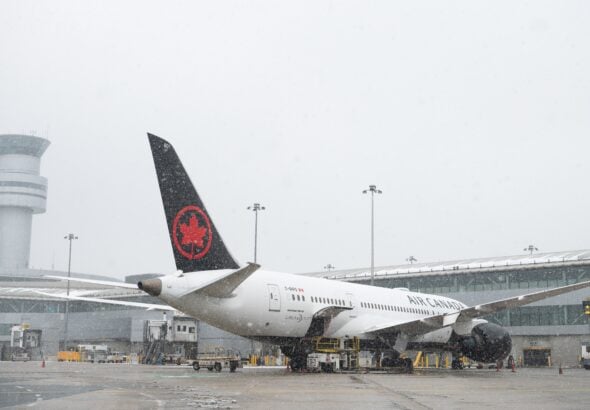 Air Canada Boeing 787 parked at a terminal